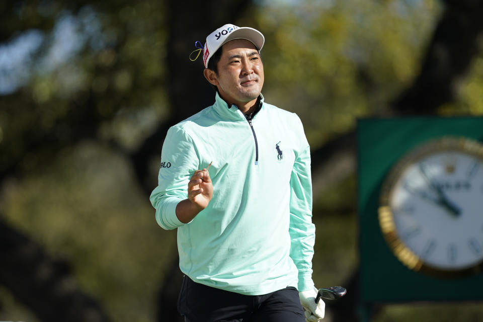 Takumi Kanaya waves after his tee shot on the first hole in the second round of the Dell Technologies Match Play Championship golf tournament, Thursday, March 24, 2022, in Austin, Texas. (AP Photo/Tony Gutierrez)