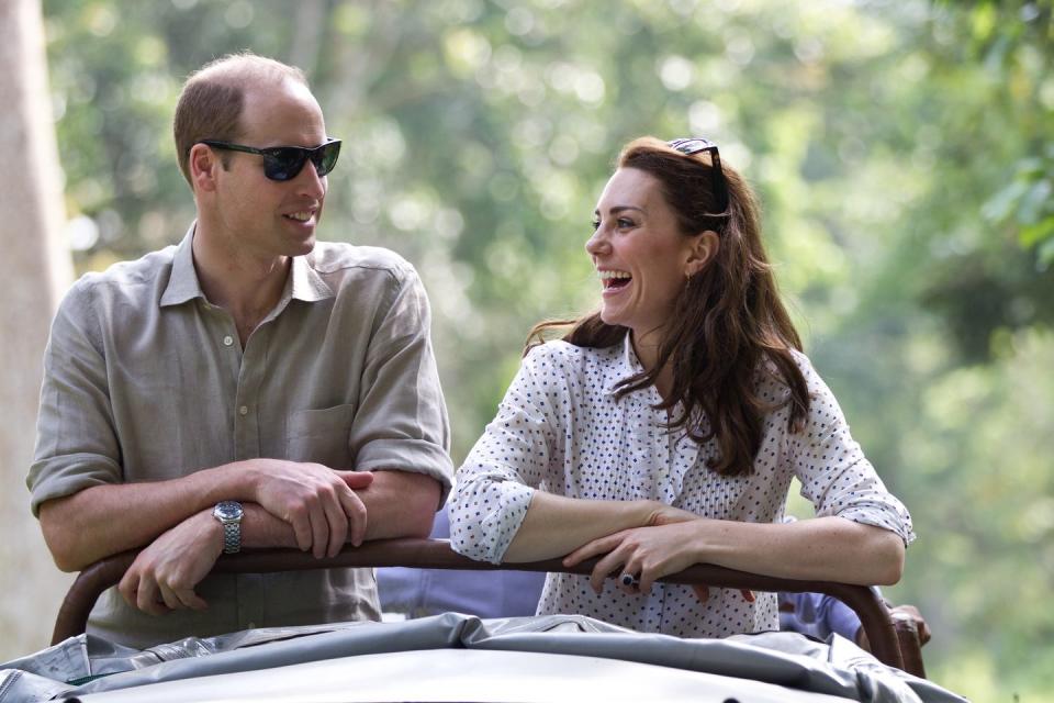 Casually laughing their way through an open-air safari in India.