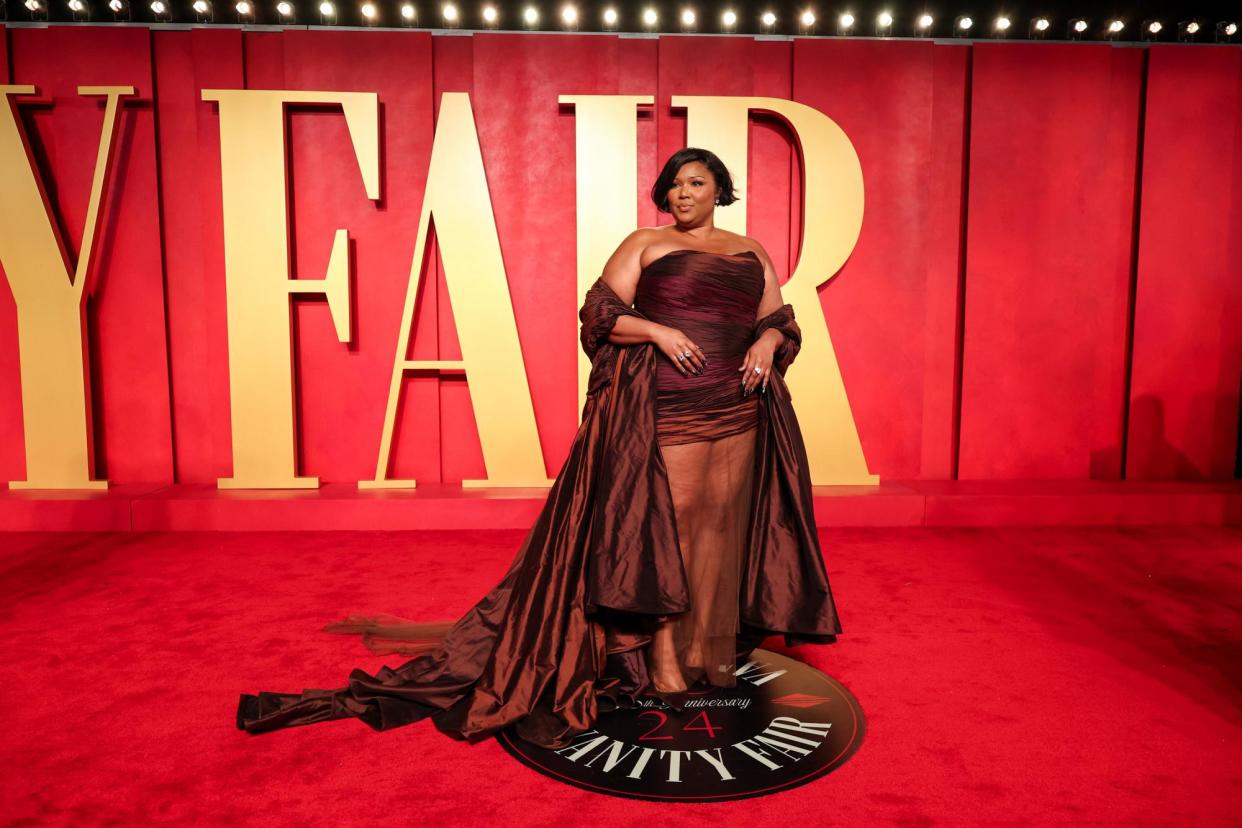 <span>Lizzo at the Vanity Fair Oscars party in Beverly Hills earlier this month.</span><span>Photograph: Christopher Polk/Variety/Getty Images</span>