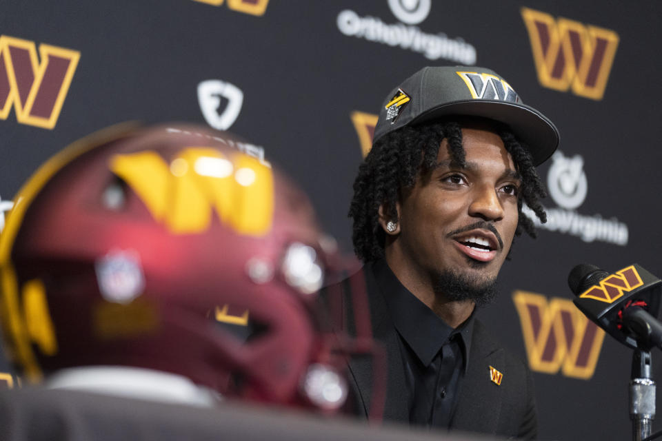 Washington Commanders' first round draft pick Jayden Daniels speaks to reporters during an NFL football news conference in Ashburn, Va., Friday, April 26, 2024. (AP Photo/Manuel Balce Ceneta)