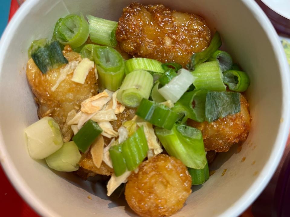 Tater tots in tub at Jolibee.