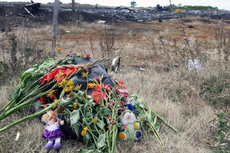Flowers laid at the scene of the crash