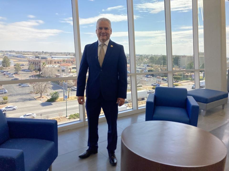 Armando Aguirre, executive director of Education Service Center Region19, stands inside the front of the new Starlight Event Center. The building has large windows all the way around, providing great views of the city.