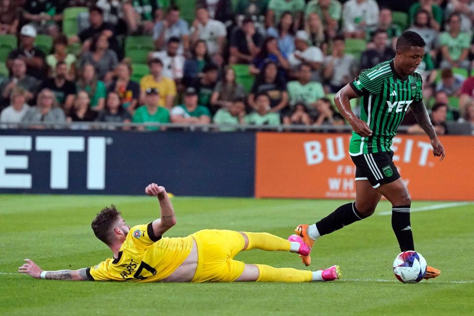 Austin FC midfielder Jhojan Valencia dribbles past New Mexico United forward Greg Hurst during the second half of El Tree's 2-0 win Wednesday in the U.S. Open Cup at Q2 Stadium.