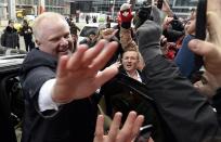 Toronto Mayor Rob Ford celebrates Team Canada's gold medal win over Sweden in the men's ice hockey gold medal game at the Sochi 2014 Winter Olympic Games, in Toronto February 23, 2014. REUTERS/Aaron Harris (CANADA - Tags: POLITICS)