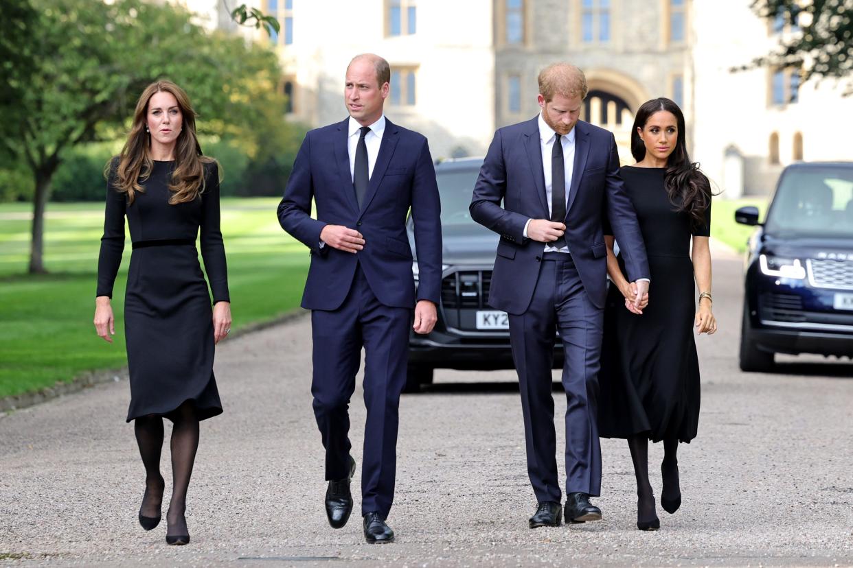 Catherine, Princess of Wales (from left), Prince William, Prince of Wales, Prince Harry, Duke of Sussex, and Meghan, Duchess of Sussex, on the long walk at Windsor Castle on Sept. 10, 2022, in Windsor, England.