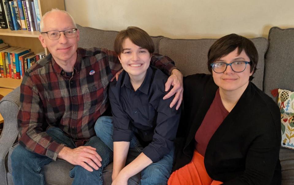 Richard, Puck and Ulrike Carlson. Puck, a high school junior from Iowa City, is one of the plaintiffs in a lawsuit challenging Iowa's sweeping law that restricts LGBTQ instruction in elementary school and bans books depicting sex acts from schools.