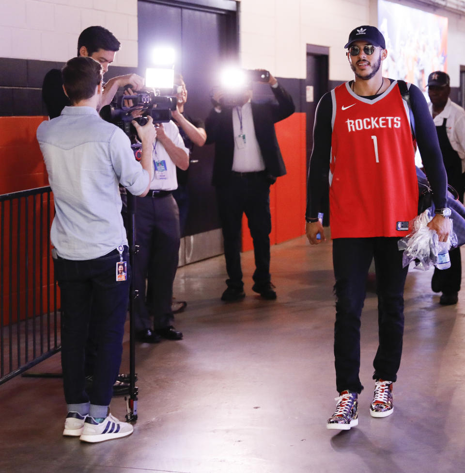 Carlos Correa of the Houston Astros leaves for the team bus dressed in a Houston Rockets jersey to show support at Minute Maid Park on May 13, 2018 in Houston, Texas. (Photo by Bob Levey/Getty Images)