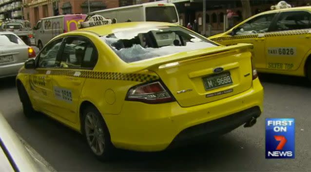 A man with a cricket bat has smashed the front and back windows of up to six cabs in Melbourne's CBD. Source: 7 News.