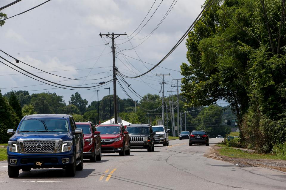 Cars begin to stack up at the intersection of Whitfield Road and Needmore Road in Clarksville. Transportation components are key to the city's budgeting this year.