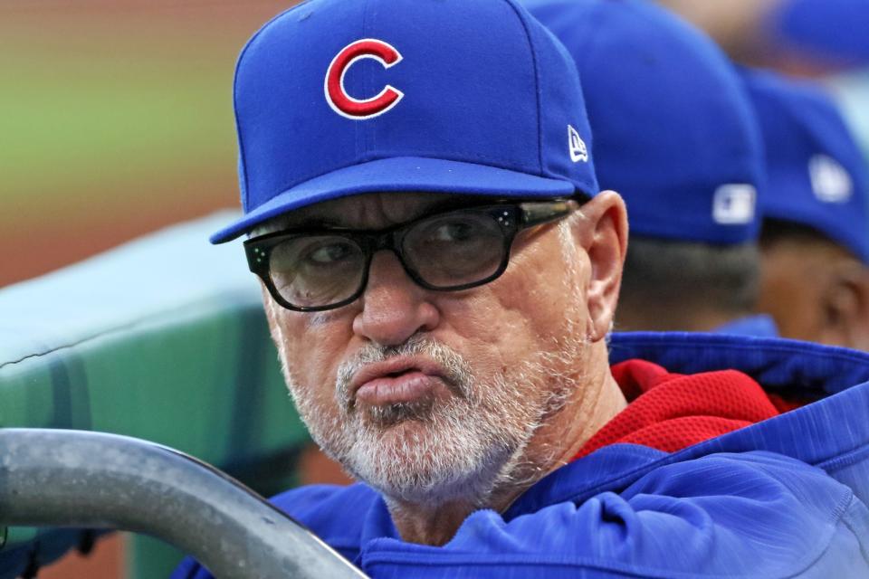 Joe Maddon pondering his next lineup move, probably. (AP)