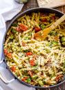 <p>When you've got pesto, you won't miss heavy sauces.</p><p>Get the recipe from <a rel="nofollow noopener" href="http://ifoodreal.com/healthy-pesto-tomato-and-broccoli-pasta/" target="_blank" data-ylk="slk:iFoodreal;elm:context_link;itc:0;sec:content-canvas" class="link ">iFoodreal</a>.</p>
