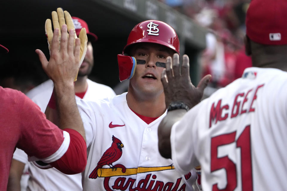 St. Louis Cardinals' Lars Nootbaar is congratulated by teammates after hitting a solo home run during the first inning of a baseball game against the Chicago Cubs Friday, July 28, 2023, in St. Louis. (AP Photo/Jeff Roberson)