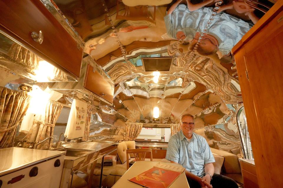 David Neel, executive director of the Murphy Auto Museum in Oxnard, sits inside a 1948 Airstream Wee Wind on April 15. The museum is expected to close in July.