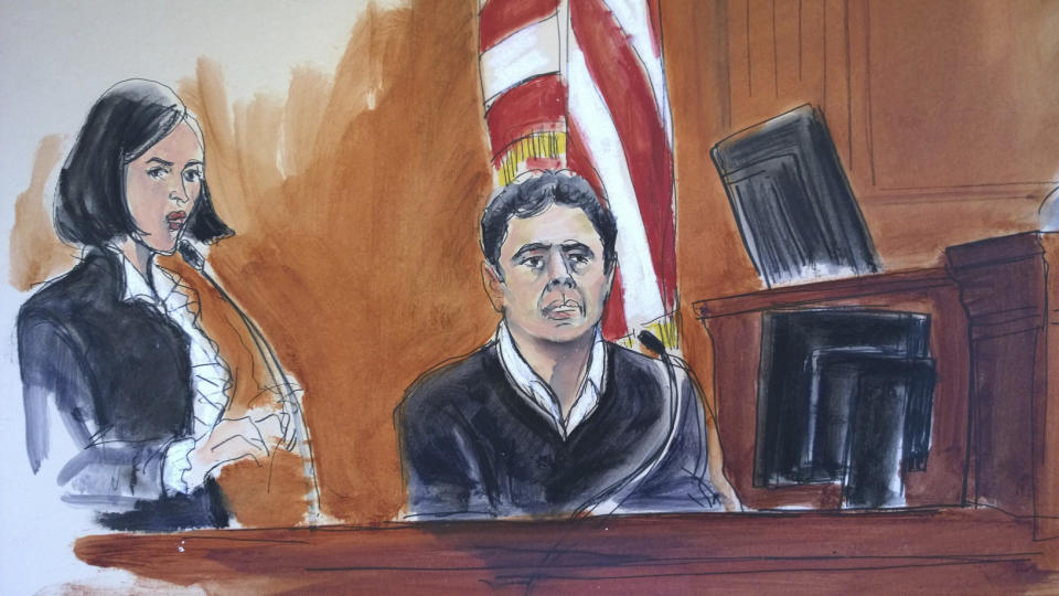 FILE - In this Dec. 15, 2017, file courtroom sketch, Mehmet Hakkan Atilla, right, testifies in his trial in New York. Atilla, a Halkbank official, was convicted in 2018 of conspiracies to violate U.S. sanctions law, defraud the U.S. and commit money laundering and bank fraud. Halkbank, a major Turkish bank, was criminally charged in an indictment Tuesday, Oct. 15, 2019, with participating in a multibillion-dollar scheme to evade U.S. sanctions against Iran. In a release, U.S. Attorney Geoffrey S. Berman said senior bank officials designed and carried out the scheme to move billions of dollars of Iranian oil revenue illegally. (Elizabeth Williams via AP, File )