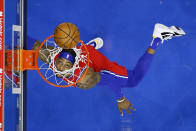 Philadelphia 76ers' Dwight Howard watches his shot go in the basket during the first half of an NBA basketball game against the Los Angeles Lakers, Wednesday, Jan. 27, 2021, in Philadelphia. (AP Photo/Matt Slocum)