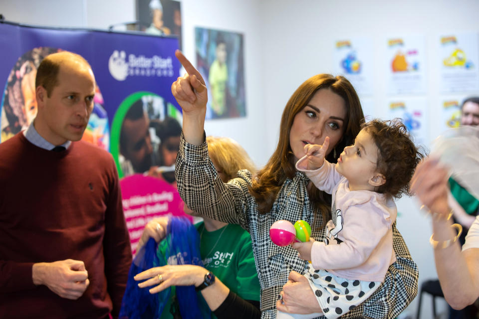 BRADFORD, ENGLAND - JANUARY 15: Prince William, Duke of Cambridge and Catherine, Duchess of Cambridge meet 18 Month old Sorayah Ahmad at the Khidmat Centre on January 15, 2020 in Bradford, United Kingdom. (Photo by Charlotte Graham - WPA Pool/Getty Images)