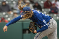 Kansas City Royals relief pitcher Scott Barlow delivers against the Cleveland Guardians during the eighth inning of a baseball game in Cleveland, Sunday, Oct. 2, 2022. (AP Photo/Phil Long)