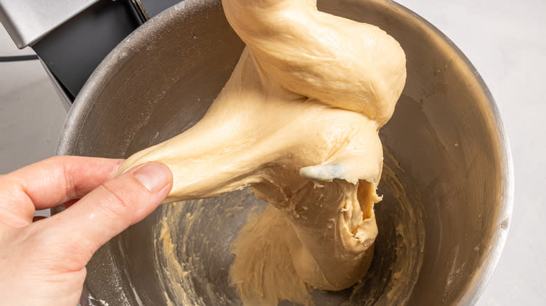 Stretching a dough from a dough hook in a stand mixer