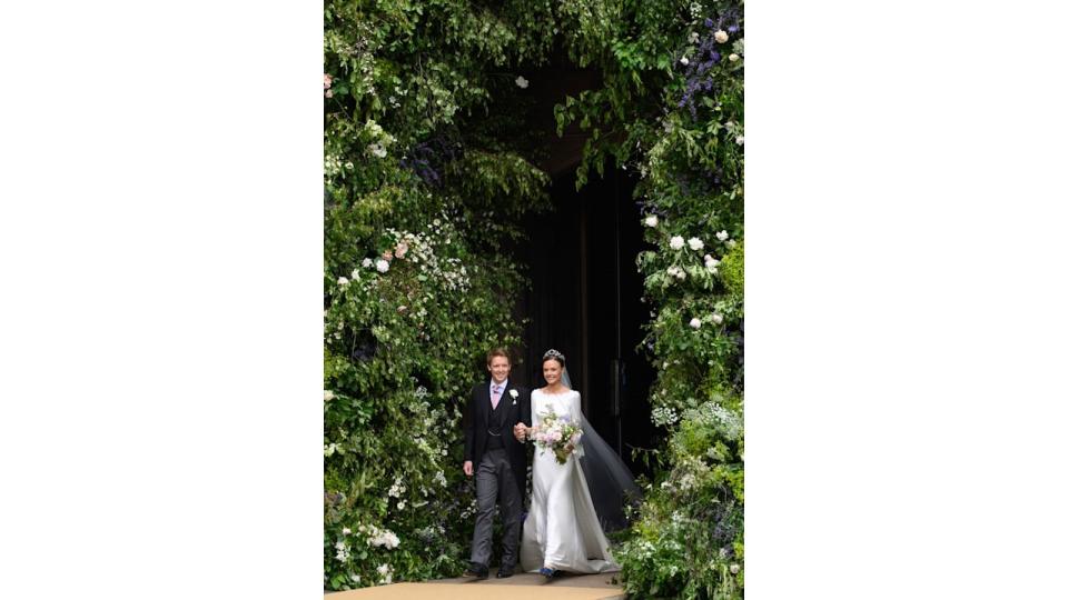 The bride and groom leaving Chester Cathedral