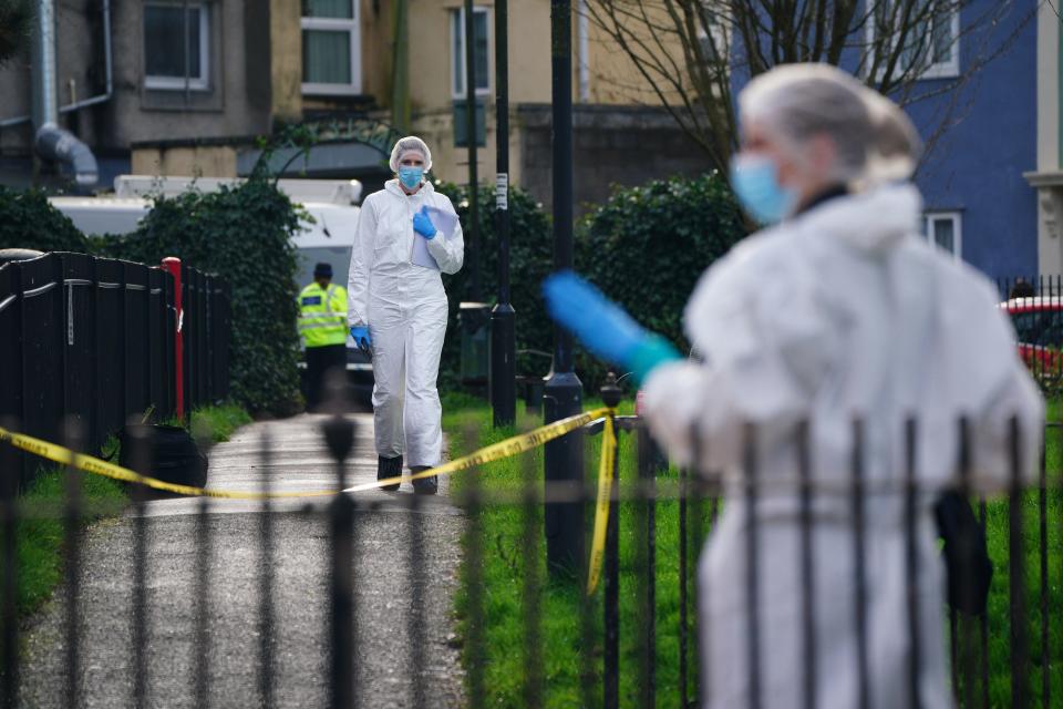 Police and forensic officers at Rawnsley Park near to the scene in the St Philips area of Bristol where a 16-year-old boy has died after being stabbed on Wednesday evening (PA)