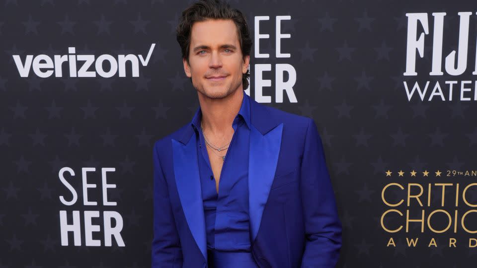 Matt Bomer, nominated in the best actor category for “Fellow Travelers,” brought contrast to the red carpet with a sleek bright blue Berluti suit and matching Oxford shoes. - Jordan Strauss/Invision/AP