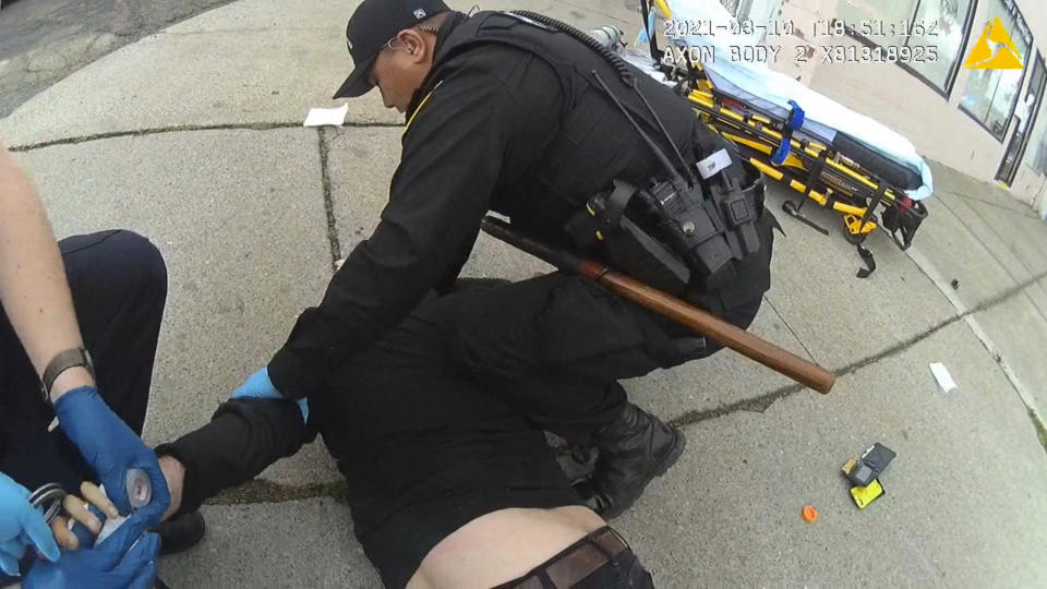 In this image from Richmond Police Department body-camera video, police restrain Ivan Gutzalenko in Richmond, Calif., on March 10, 2021. (Richmond Police Department via AP)