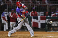 Puerto Rico's Yadier Molina bats during the third inning against the Dominican Republic in the Caribbean Series baseball final at Teodoro Mariscal stadium in Mazatlan, Mexico, Saturday, Feb. 6, 2021. (AP Photo/Moises Castillo)