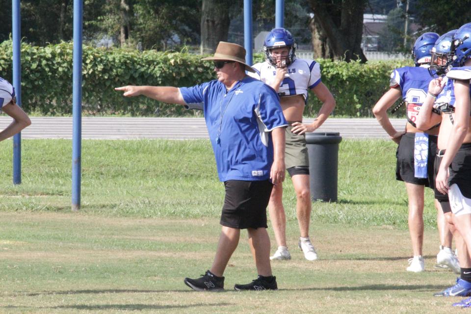 Jay football head coach Brian Watson instructs players during a practice on Monday, Aug. 7, 2023.