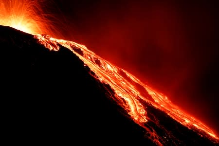 Lava flows from the Stromboli volcano a day after an eruption unleashed a plume of smoke on the Italian island of Stromboli