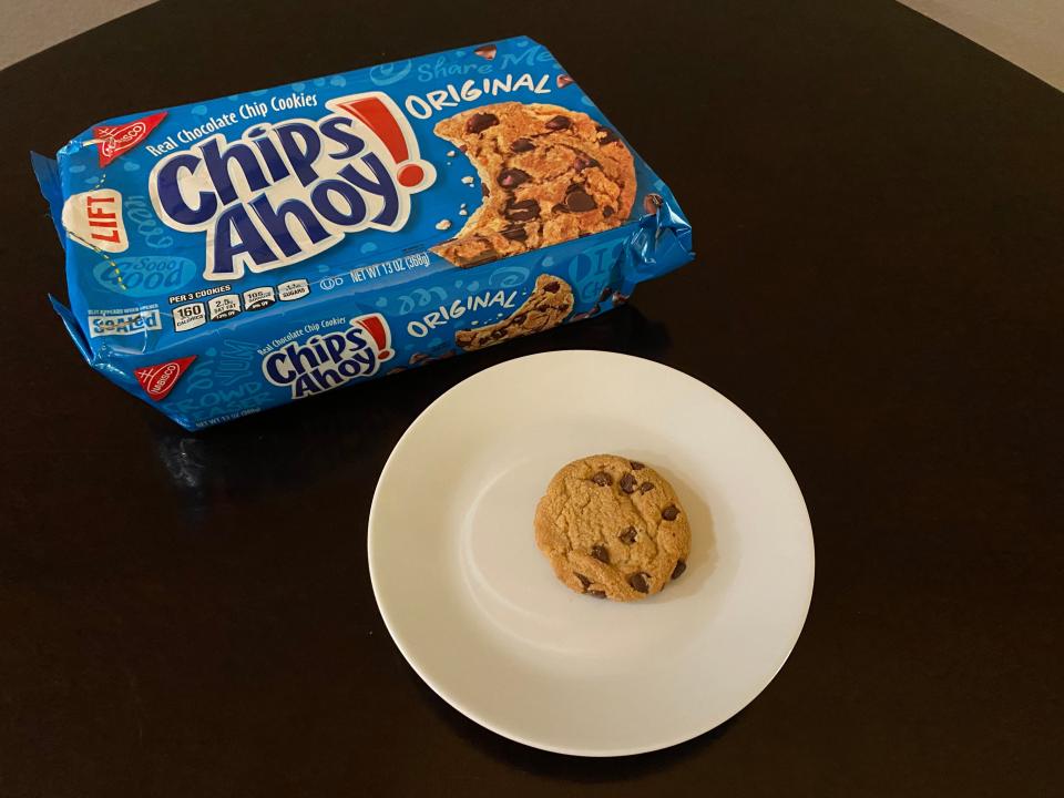 package of original chips ahoy cookies with a cookie on a plate in front