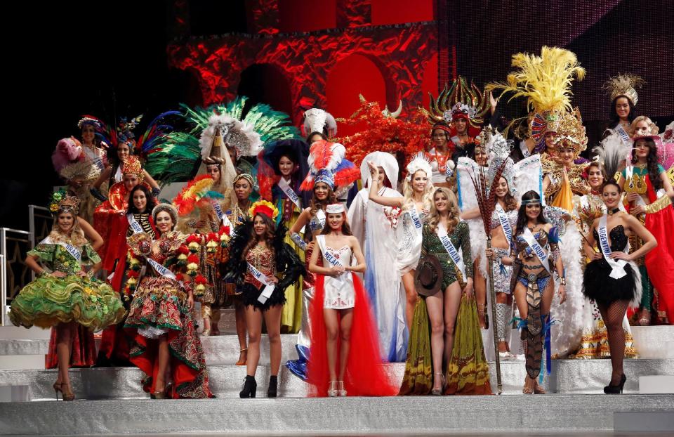 Contestants wearing national costumes pose in the opening of the 56th Miss International Beauty Pageant in Tokyo, Japan October 27, 2016. REUTERS/Kim Kyung-Hoon