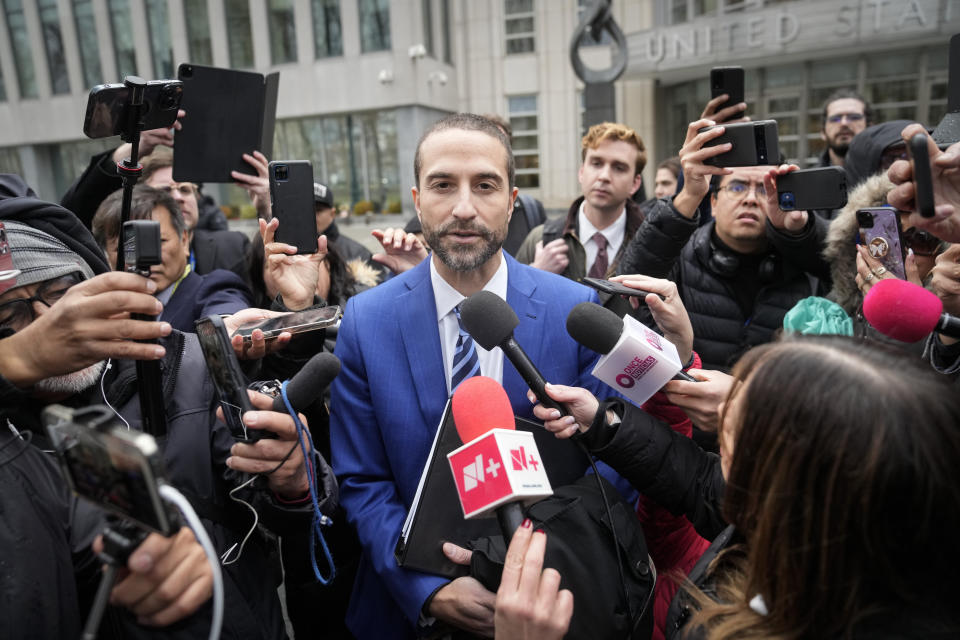 Cesar De Castro, attorney for Genaro Garcia Luna, speaks to the media after his client was found guilty of taking massive bribes to protect the violent drug cartels he was tasked with combating, Tuesday, Feb. 21, 2023, in New York. Luna headed Mexico's federal police and then was its top security official from 2006 to 2012. (AP Photo/John Minchillo)