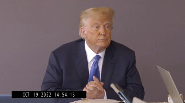 In this image taken from video released by Kaplan Hecker & Fink, former President Donald Trump pauses during his Oct. 19, 2022, deposition for his trial against writer E. Jean Carroll. The video recording of Trump being questioned about the rape allegations against him was made public for the first time Friday, May 5, 2023, providing a glimpse of the Republican's emphatic, often colorful denials. (Kaplan Hecker & Fink via AP)