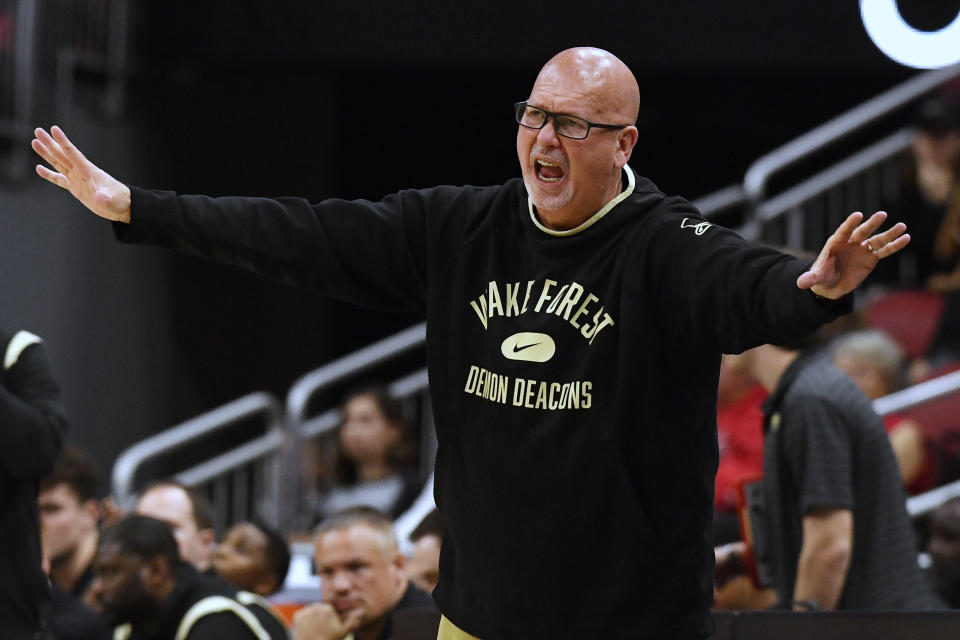 FILE - Wake Forest coach Steve Forbes shouts to the team during the second half of an NCAA college basketball game against Louisville in Louisville, Ky., Dec. 29, 2021. Forbes quickly built success for a long-struggling program. The test now is sustaining that in a time of transfers and roster turnover. (AP Photo/Timothy D. Easley, File)