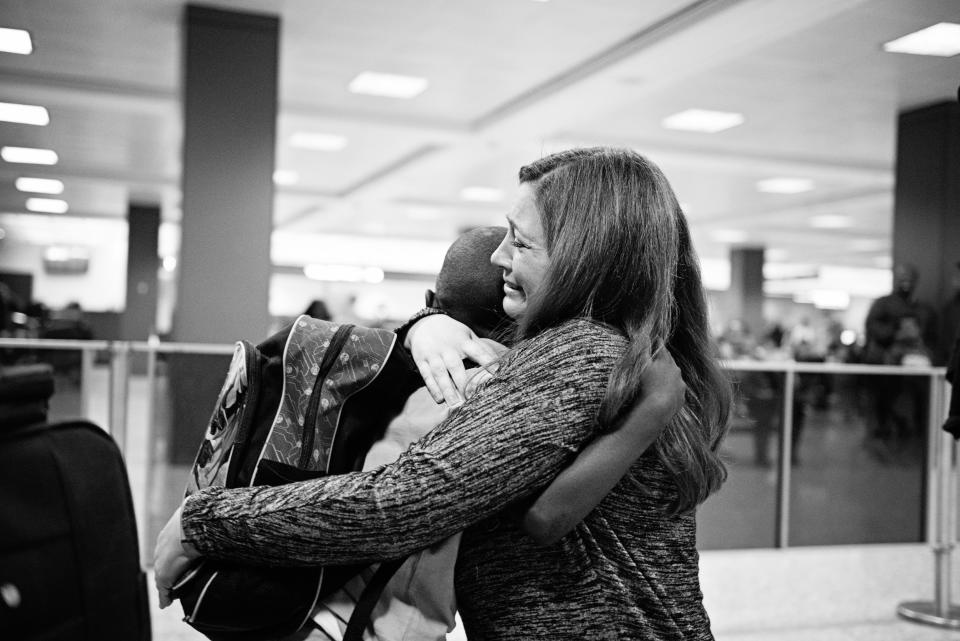 "Shannon finally gets to hold her son Mathieu for the first time. Mathieu was adopted from&nbsp;the Democratic Republic of the Congo." -- Sandra Eminger