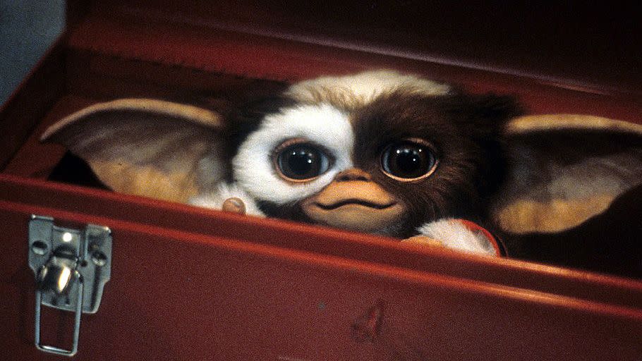 a scene from gremlins, a good housekeeping pick for best christmas movies for kids
