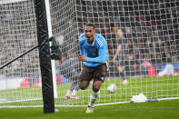 Belgium's Youri Tielemans celebrates after scoring his side's second goal during an international friendly soccer match between England and Belgium at Wembley Stadium, in London, Tuesday, March 26, 2024. (AP Photo/Kirsty Wigglesworth)