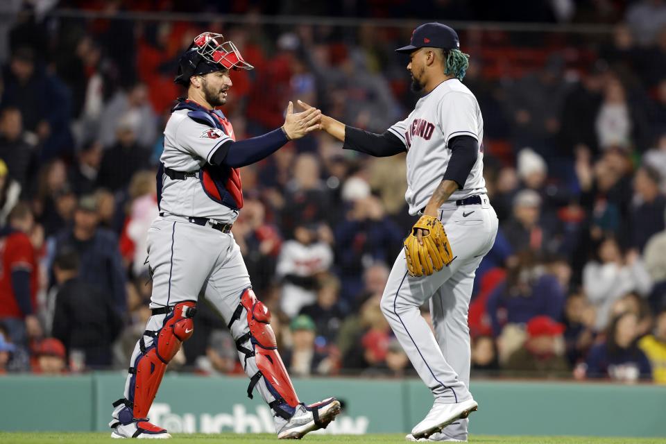 Cleveland Guardians' Emmanuel Clase, right, and Mike Zunino, left, celebrate after defeating the Boston Red Sox in a baseball game, Friday, April 28, 2023, in Boston. (AP Photo/Michael Dwyer)