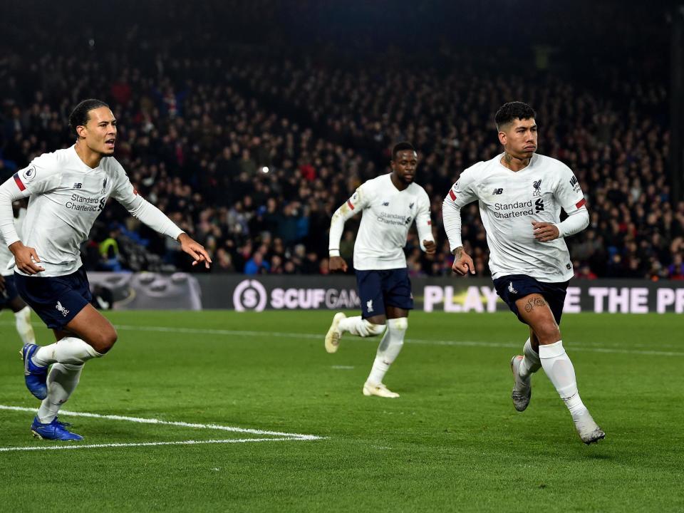 Roberto Firmino celebrates after scoring Liverpool's winner: Getty