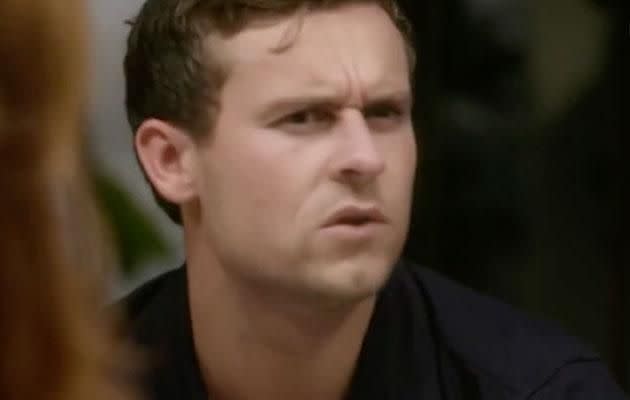 Ryan looks extremely annoyed by Dean's presence at the dinner party. Source: Nine
