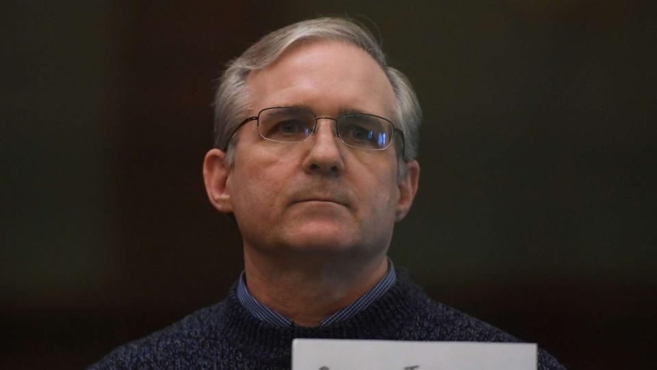PHOTO: Paul Whelan, a former US marine accused of espionage and arrested in Russia in December 2018, stands inside a defendants' cage as he waits to hear his verdict in Moscow, June 15, 2020. (Kirill Kudryavtsev/AFP via Getty Images)