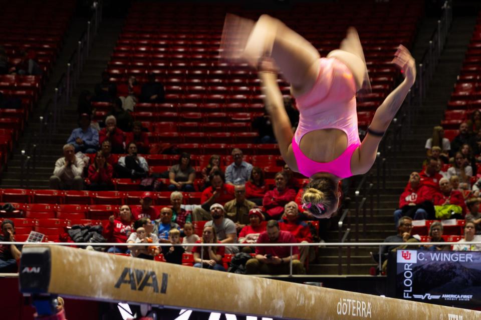 Makenna Smith performs her bar routine during the Red Rocks Preview at the Jon M. Huntsman Center in Salt Lake City on Friday, Dec. 15, 2023. | Megan Nielsen, Deseret News