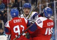 Ice Hockey – Pyeongchang 2018 Winter Olympics – Men Preliminary Round Match – Czech Republic v South Korea - Gangneung Hockey Centre, Gangneung, South Korea – February 15, 2018 - Alex Plante of South Korea (C) pushes Jan Kovar of the Czech Republic as Martin Erat of the Czech Republic looks on. REUTERS/Kim Kyung-Hoon