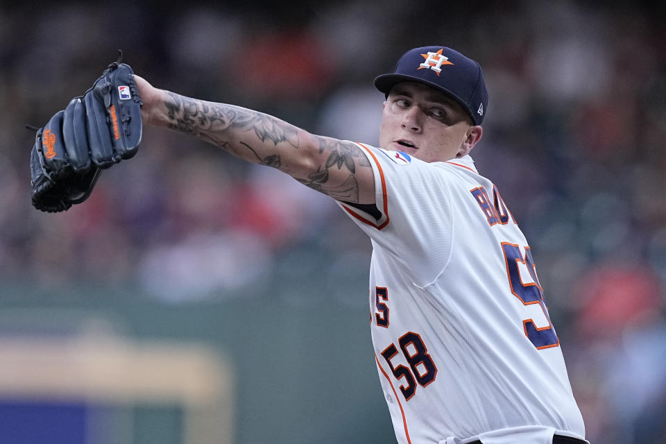 Houston Astros starting pitcher Hunter Brown delivers during the first inning of a baseball game against the San Francisco Giants, Tuesday, May 2, 2023, in Houston. (AP Photo/Kevin M. Cox)