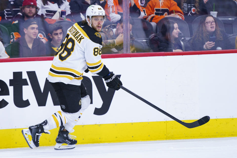 Boston Bruins' David Pastrnak skates up the ice during the second period of an NHL hockey game against the Philadelphia Flyers, Sunday, April 9, 2023, in Philadelphia. (AP Photo/Chris Szagola)