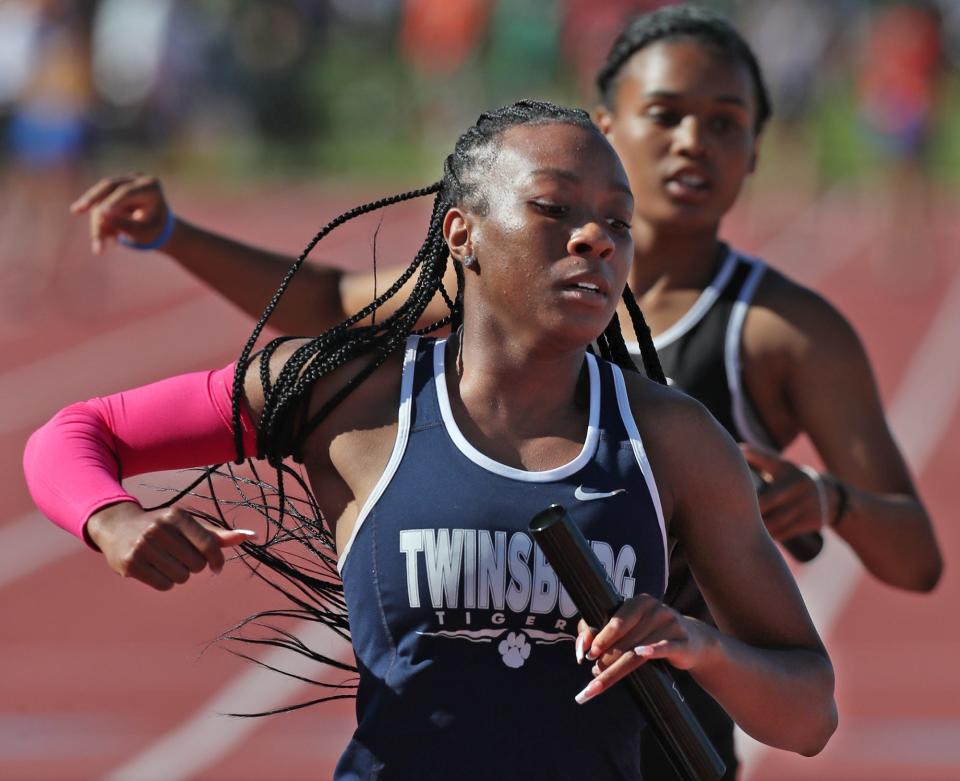 Twinsburg's anchor runner Paris Gosha-Foreman raced her team to a third place finish in the girls 4 x100 meter relay at the Div. I state track and field championships at Jesse Owen Stadium in Columbus on Saturday.