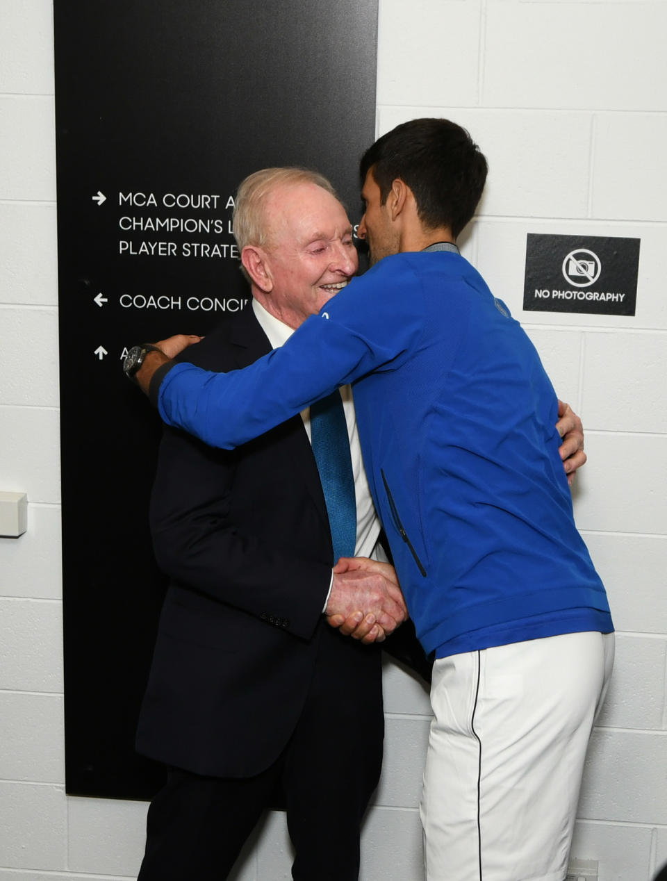 MELBOURNE, AUSTRALIA - JANUARY 27:  Novak Djokovic of Serbia is congratulated by Rod Laver  following victory in his Men's Singles Final match against Rafael Nadal of Spainduring day 14 of the 2019 Australian Open at Melbourne Park on January 27, 2019 in Melbourne, Australia. (Photo by Vince Caligiuri/Getty Images for Tennis Australia)