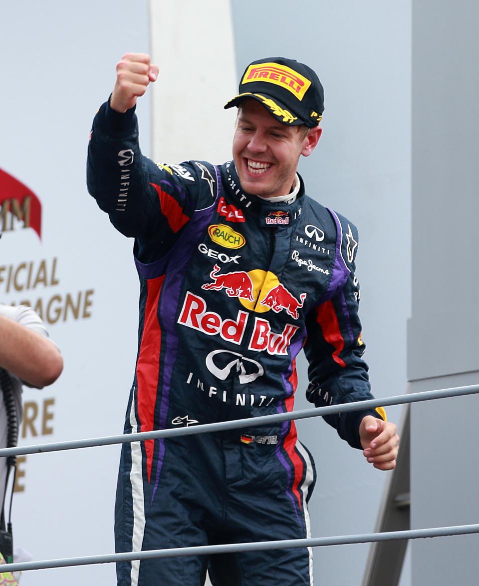 Red Bull Racing's Sebastian Vettel celebrates on the podium after victory in the Italian Grand Prix and the Autodromo Nazionale Monza, Monza, Italy.