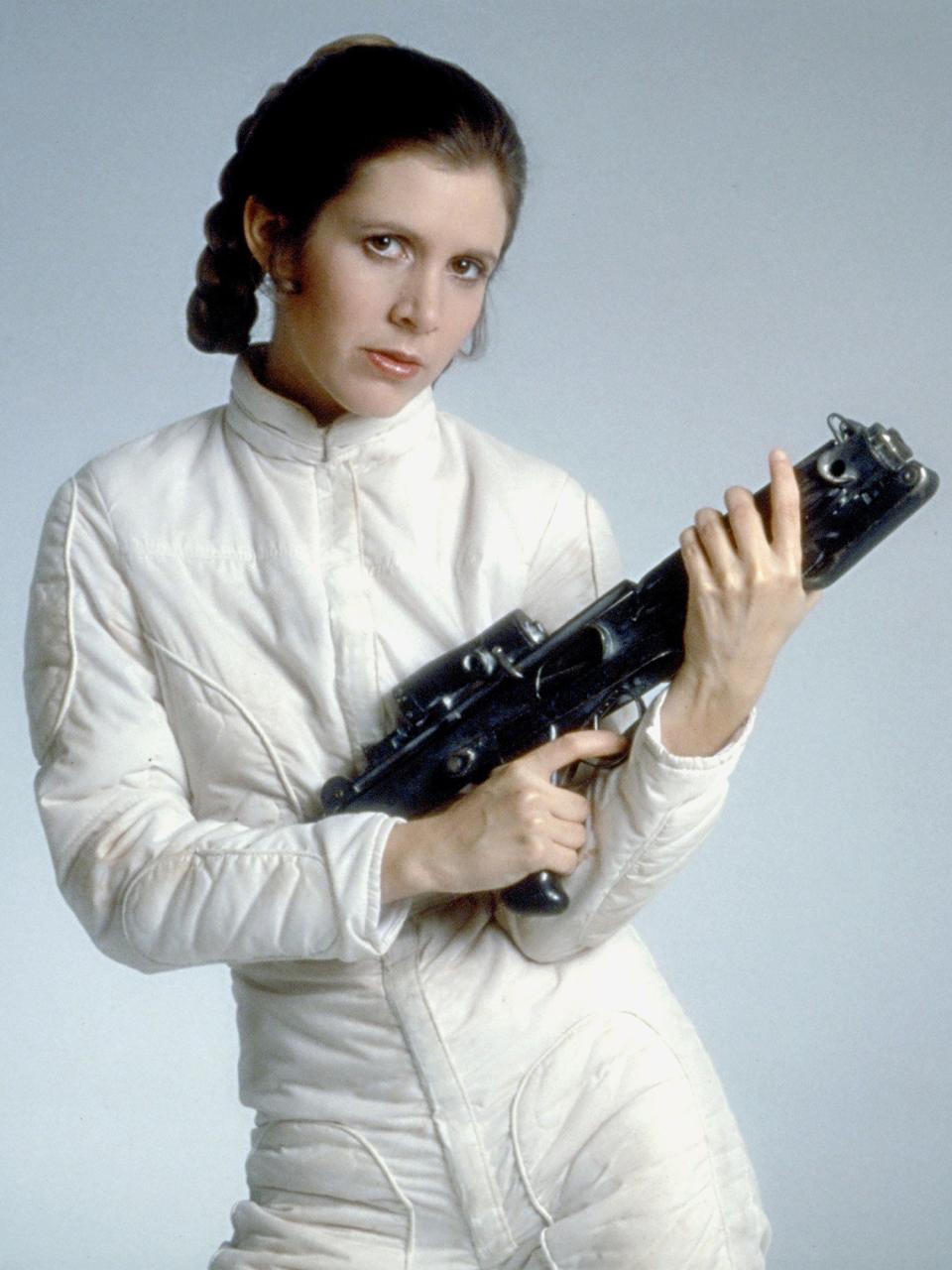 Carrie Fisher struck a pose during a promotional shot for <em>Star Wars: Episode V - The Empire Strikes Back</em>.